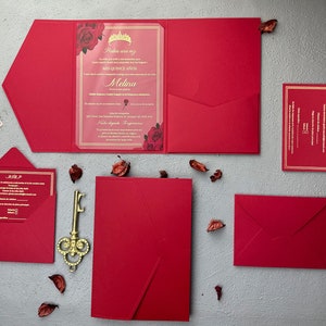 Gold gilded acrylic Quienceañera invitation set with red floral rose print detail, Invitation envelope with three fold pockets, Gold rsvp