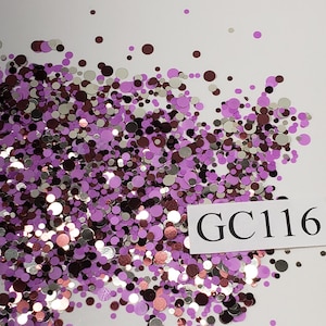 May include: A close-up of a mix of purple, silver, and brown glitter. The glitter is in the shape of small circles. The glitter is labeled "GC116".