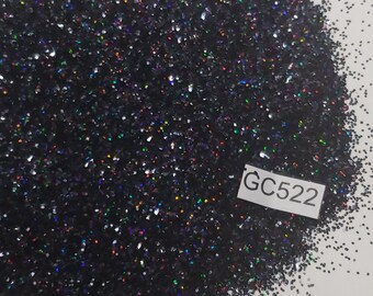May include: Black iridescent glitter with a white label that says "GC522".