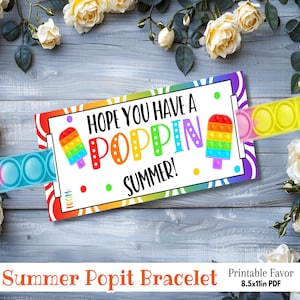 May include: Printable summer party favour with a rainbow pop it bracelet and a card that says "Hope you have a poppin summer!"