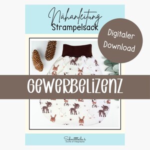 May include: A sewing pattern for a baby sleeping bag featuring a white fabric with a repeating pattern of brown donkeys, rabbits, and white geese. The pattern includes a dark brown collar and the text NÄHANLEITUNG STRAMPELSACK, DIGITALER DOWNLOAD, and GEWERBELIZENZ.