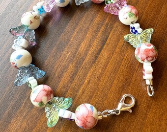 Spring Garden Bracelet, Lily Pattern Beads, Millefiori Flowers, Crystal Butterfly Accents, Colorful Floral gift