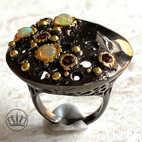 Volana Opal shops and Rhodolite Shield Ring