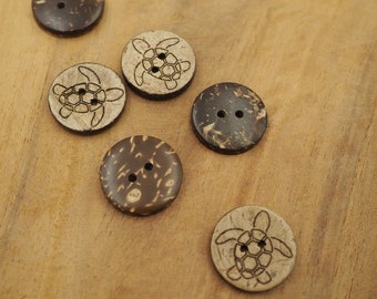 May include: Six brown coconut shell buttons with two-hole and turtle designs.