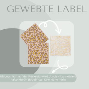 May include: Square fabric labels with a leopard print design in tan, brown, and yellow. The text "GEWEBTE LABEL" is at the top. The text at the bottom says, "Adhesive on the back is activated by heat, adheres by ironing - no sewing required."