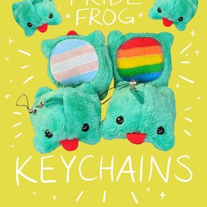 May include: Four plush frog keychains with different pride flag designs. The frogs are teal green with red tongues and black eyes. The flags are transgender, rainbow, and two solid teal green. The text "PRIDE: FROG + KEYCHAINS" is written in white on a yellow background.
