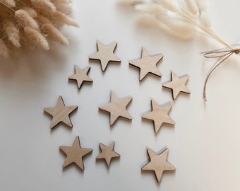 Wooden stars in different sizes 10 pieces