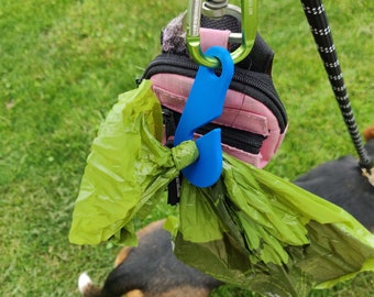 The DooClaw Mini poop bag holder.  Mini but mighty when it comes to big loads.