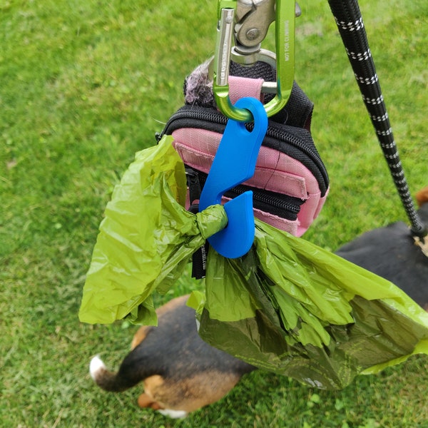 The DooClaw Mini poop bag holder.  Mini but mighty when it comes to big loads.