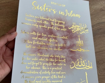 May include: A gold foil print with a watercolor background. The print features the text "States of Sisters in Islam" and includes Islamic calligraphy. The text describes the importance of sisters in Islam and how they should treat each other.