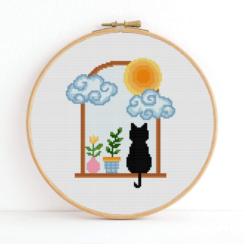 May include: Cross stitch pattern featuring a black cat sitting in a window with a yellow sun, clouds, and potted plants.