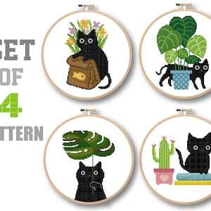 May include: Set of four cross stitch patterns featuring black cats with various plants and objects. The patterns include a cat with a bag of fish, a cat with a potted plant, a cat with a monstera leaf, and a cat with a cactus and books.