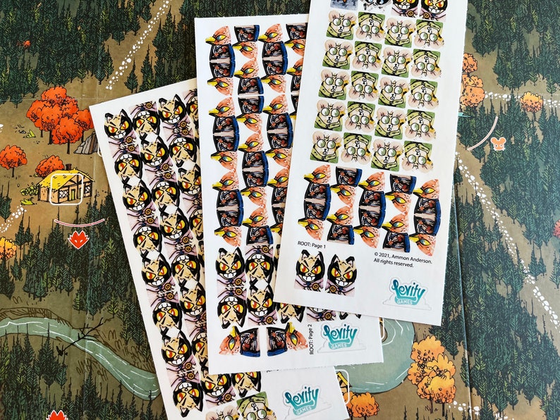 May include: Three sheets of stickers featuring colorful illustrations of cats and other creatures. The stickers are labeled "Rooti - Page 1" and "Rooti - Page 2". The stickers are from the game "Sevity Games".