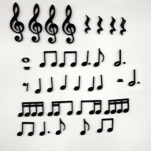 May include: Black and white musical notes and treble clefs on a white background. The notes include quarter notes, eighth notes, and whole notes.