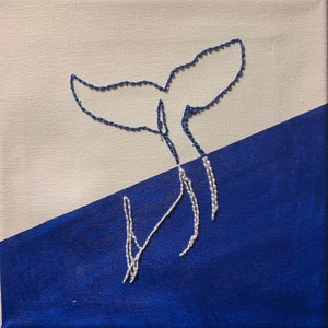 Whale embroidery on canvas