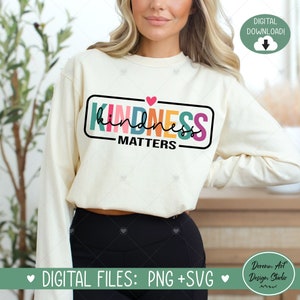 May include: A digital download of a graphic design featuring the text "KINDNESS MATTERS" in a rainbow color scheme with a small pink heart above the word "KINDNESS".