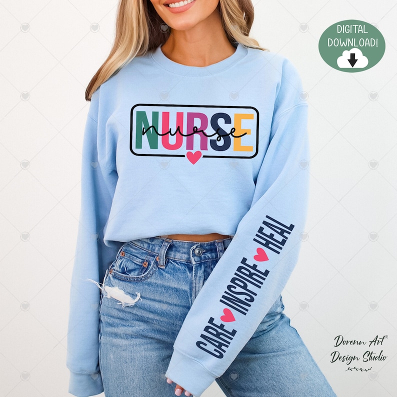 May include: A light blue sweatshirt with the word "NURSE" in colorful letters inside a rectangle. The sleeve has the words "CARE INSPIRE HEAL" with hearts between each word.