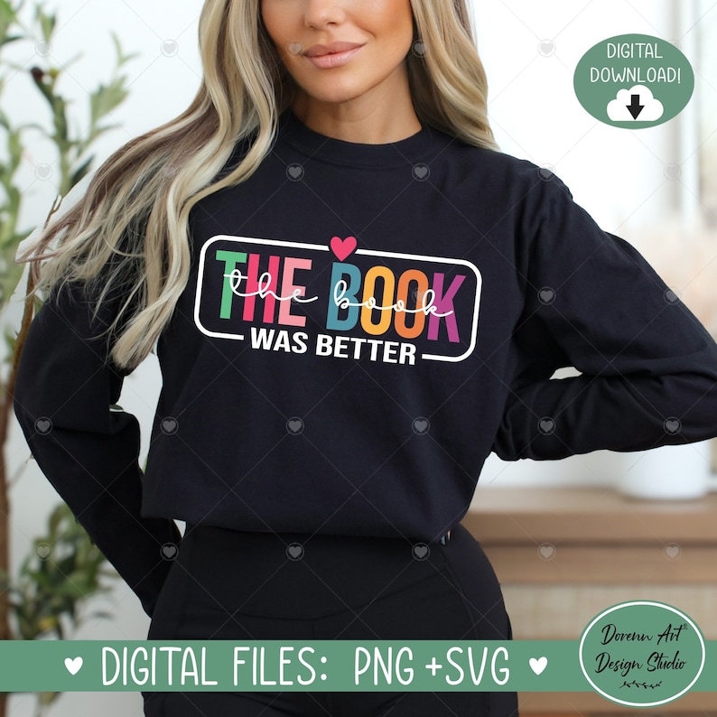 May include: A black sweatshirt with a colorful graphic that says "THE BOOK WAS BETTER" with a small red heart above the word "BOOK".