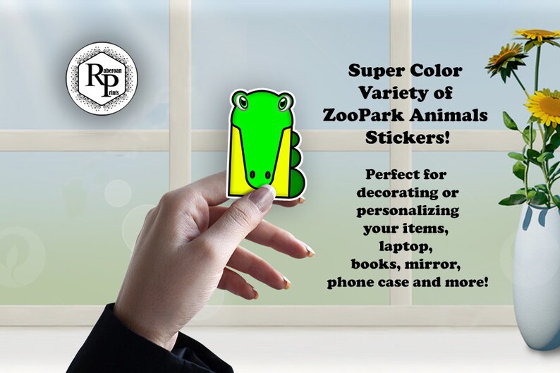 May include: A green alligator sticker with yellow accents. The sticker is being held by a hand. The text "Super Color Variety of ZooPark Animals Stickers!" is written in black text on a white background. The text "Perfect for decorating or personalizing your items, laptop, books, mirror, phone case and more!" is written in black text on a white background.