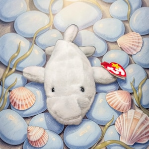 May include: A white plush beluga whale toy with black eyes and a red tag. The toy is surrounded by light blue stones, seashells, and green seaweed. The background is a light beige color.