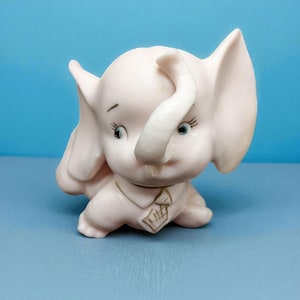 vintage Pink elephant with a necktie  porcelain figurine