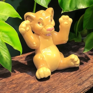 Small 2” Disneys Simba from lion king porcelain figure