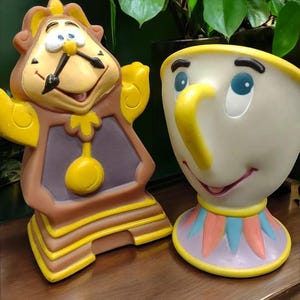 1990s Vintage Disney beauty and the beast, cogsworth and chip hand puppets from Pizza hut