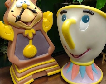 1990s Vintage Disney beauty and the beast, cogsworth and chip hand puppets from Pizza hut