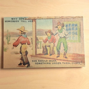 Vintage Mid-Century adult humor postcard, she should wear something under them chaps!
