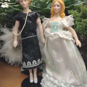 8 inch porcelain Avon dolls Roaring Twenties Girl and Angel