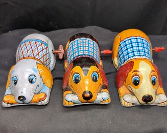 Vintage windup tin toy turning dog wind up toys