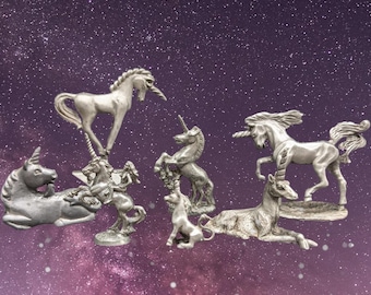 Small vintage pewter unicorn figurines
