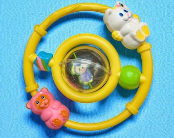 Vintage 1984 Mattel Bunny Rabbit Baby Hand Rattle Toy round circle spins