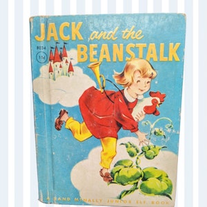 May include: A vintage children's book cover featuring a girl in a red dress holding a white chicken. The book is titled "Jack and the Beanstalk" and has a price of 15 cents. The cover is illustrated with a blue sky, white clouds, and a green beanstalk.