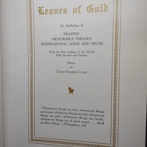 May include: A book titled "Leaves of Gold" with a gold border and a gold leaf design. The book is an anthology of prayers, memorable phrases, and inspirational verse and prose from both ancient and modern authors. The book is edited by Clyde Francis Lytle.