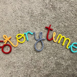 Rainbow knitted word image 4