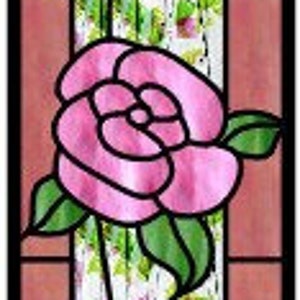 May include: A stained glass window panel featuring a pink rose vine with green leaves and a pink and white background.