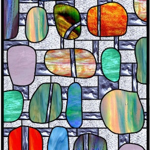 May include: Abstract stained glass window design with colorful geometric shapes. The design features a variety of colors, including blue, green, red, and purple.