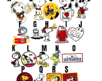 tygmärke Snoopy Peanuts karaktär stryk-på tygmärke strykapplikation serietidning Schulz vintage kärlek woodstock fågel hund vit svart Charlie Brown