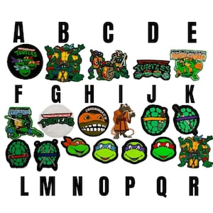 May include: A selection of Teenage Mutant Ninja Turtles patches in diverse designs. The patches showcase the turtles in action poses, logos, and individual character portraits. The patches are in various shapes, including round, square, and irregular, with vibrant colours and detailed artwork.