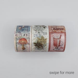 May include: Three rolls of decorative washi tape with vintage-inspired designs. The first roll features a mushroom, the second roll features leaves, and the third roll features a cup of coffee. The rolls are labeled with numbers and the word "coffee".