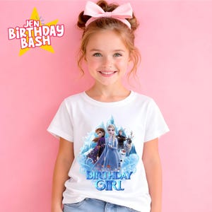 May include: A white t-shirt featuring characters from the movie Frozen, with the text "BIRTHDAY GIRL" in blue. The shirt is worn by a young girl with a pink bow in her hair. The words "JEN BIRTHDAY BASH" are in the upper left corner.