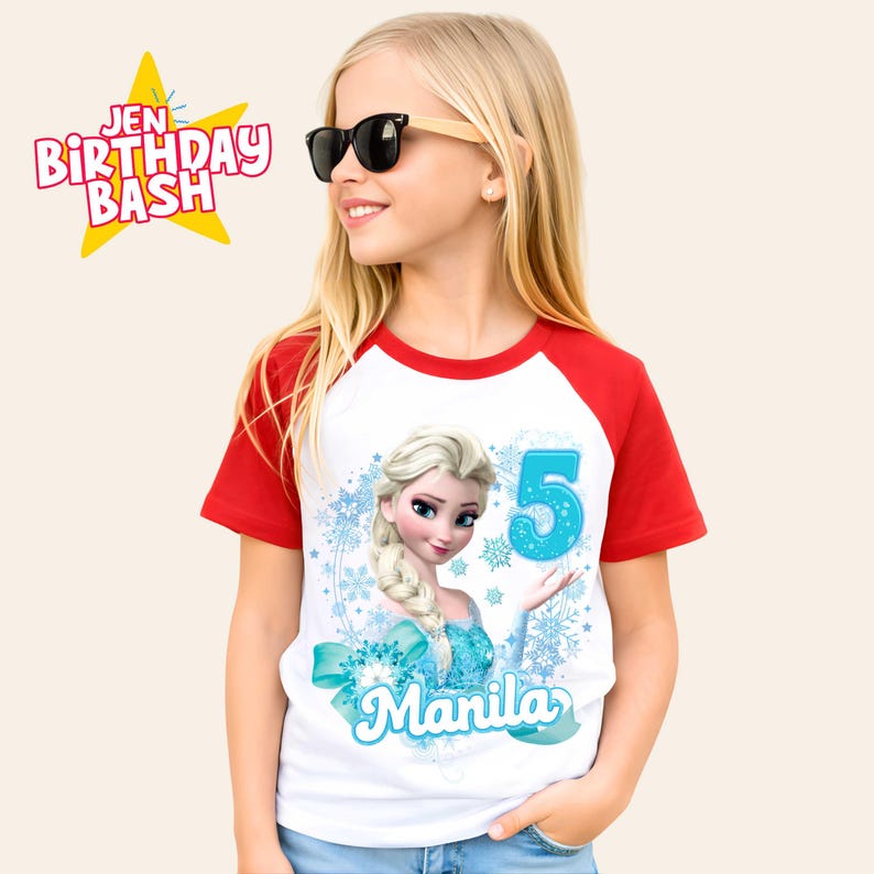 May include: A white and red short-sleeved t-shirt featuring a cartoon image of a princess with the number 5 in blue. The shirt has the text "Manila" and "Jen Birthday Bash". The girl is wearing sunglasses.