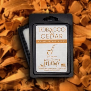 May include: Black plastic package containing scented wax cubes. The label reads "TOBACCO & CEDAR PREMIUM WAX MELTS" with a pipe illustration. The package is labeled "JUST FOR HIM" and "MAN APPROVED". The net weight is 2.5oz (70.9g).