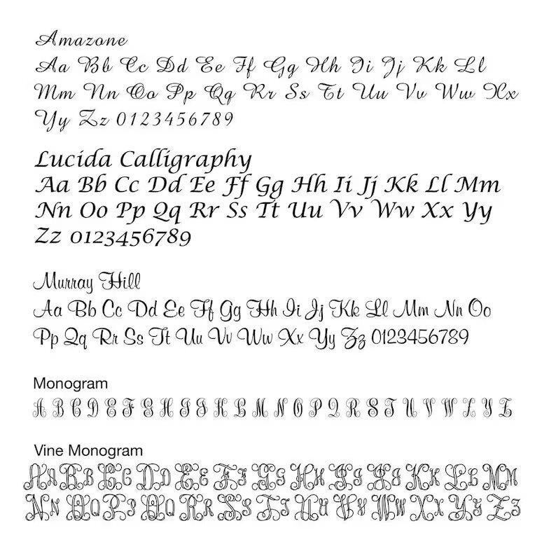 May include: A white background displays various cursive and monogram fonts, including Amazone, Lucida Calligraphy, Murray Hill, Monogram, and Vine Monogram. Each font is shown with the alphabet and numbers.