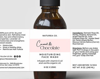 May include: A brown glass bottle with a black dropper top and a white label. The label says "Coconut & Chocolate Moisturizing Face Wash" and lists the ingredients and directions for use. The bottle contains 8 ounces (250 grams) of product.