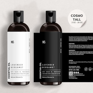 Puede incluir: Dos botellas negras de aceite esencial de bergamota y lavanda con etiquetas blancas. Las etiquetas tienen el texto "Essential Oil", "Lavender Bergamot", "With Kaolin Oil, Moisturizes Skin and Gives a Healthy Glow", "Naturea Skincare Co.", y "100% Organic Vegan". Las botellas son de 2 onzas y 16 onzas.