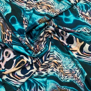 Abstract animal print on the best quality nylon spandex4-way stretch 58/60”sold by the YD. ships Worldwide from Los Angeles California USA
