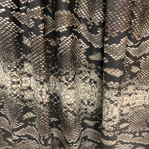 Snake skin pattern design print on nylon spandex 4-way stretch 58/60”sold by the YD. ships worldwide from Los Angeles California USA