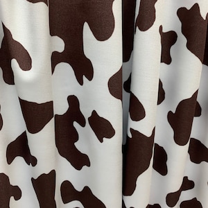 Beautiful cow design print on best quality of nylon spandex 4-way stretch 58/60”sold by the YD. ships Worldwide from Los Angeles CA USA.